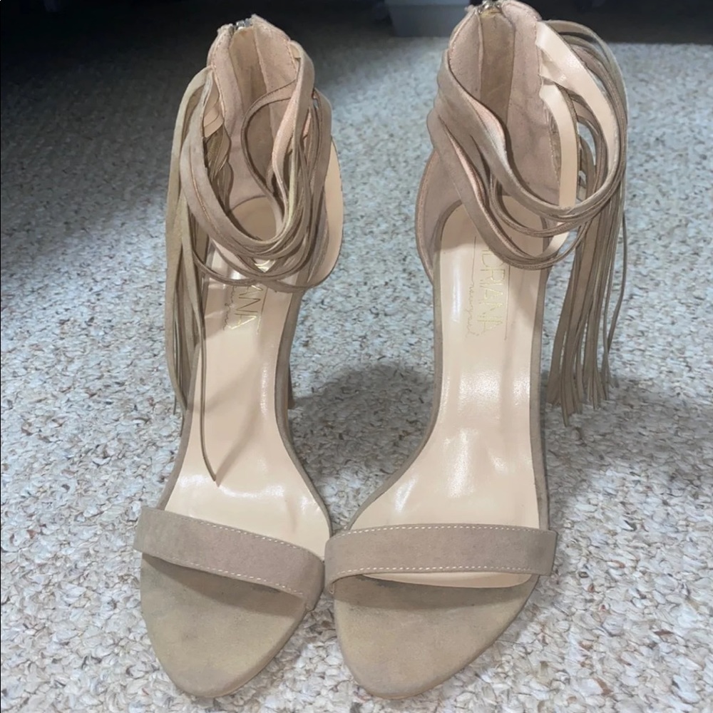 Nude fringe heels
